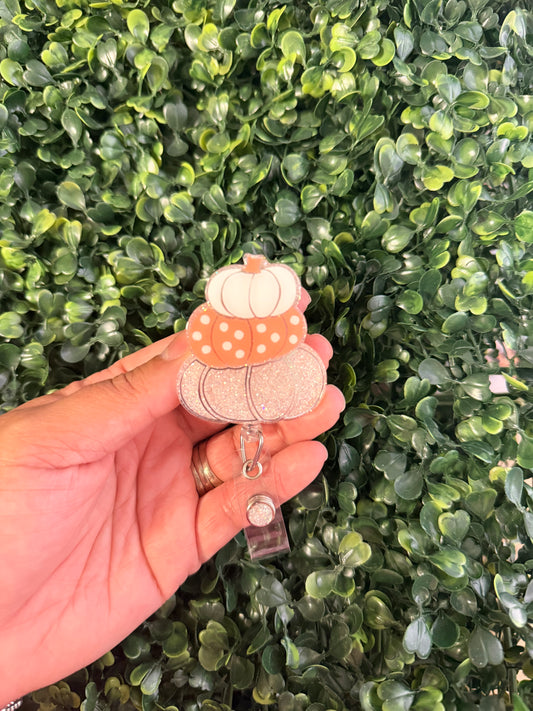 Coral Pumpkin Stack Badge Reel